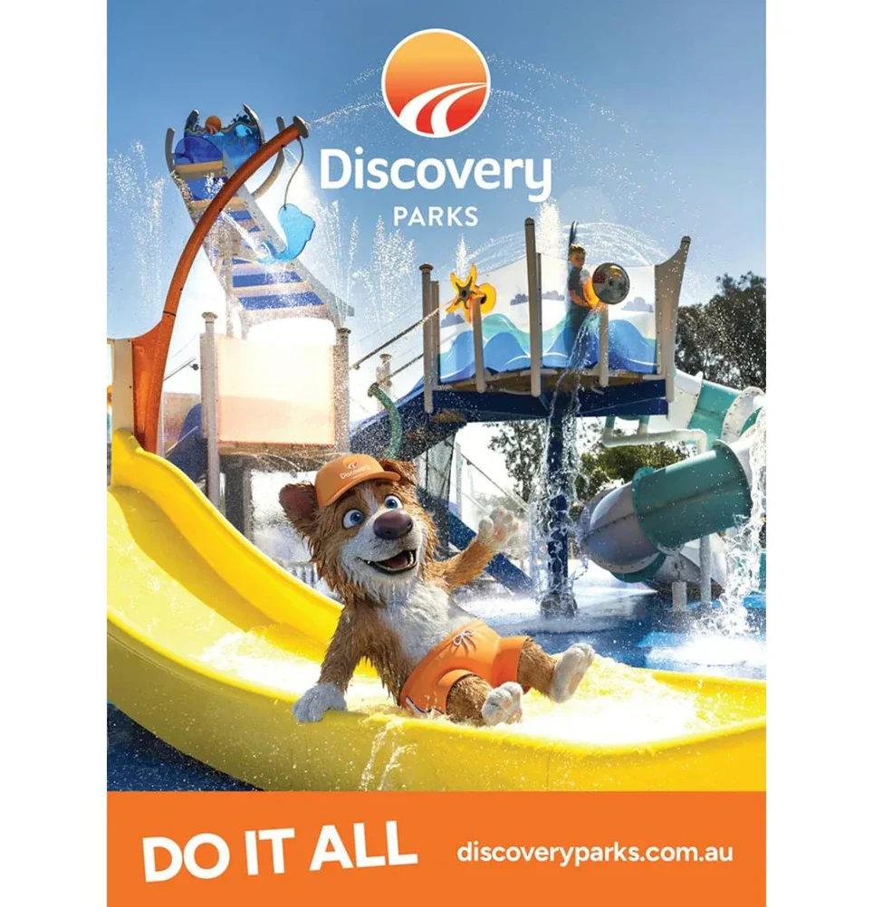 Discovery Parks Do It All poster showing Bruce riding a yellow waterpark slide