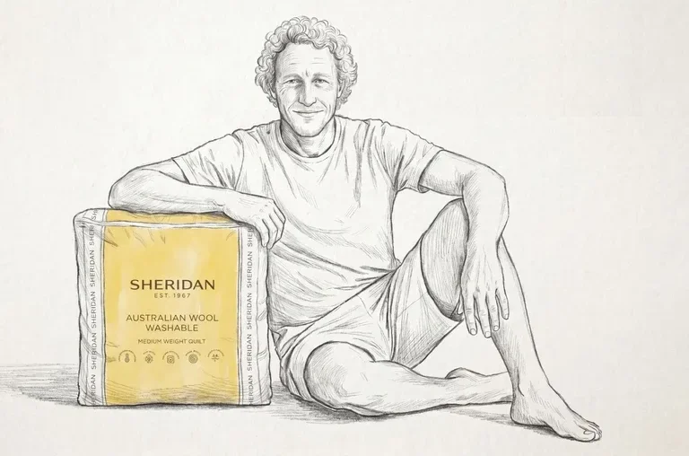 Sketch treatment of a Custom Comfort character with his Sheridan quilt