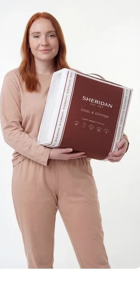 Custom Comfort character with a Sheridan Cool and Cotton quilt