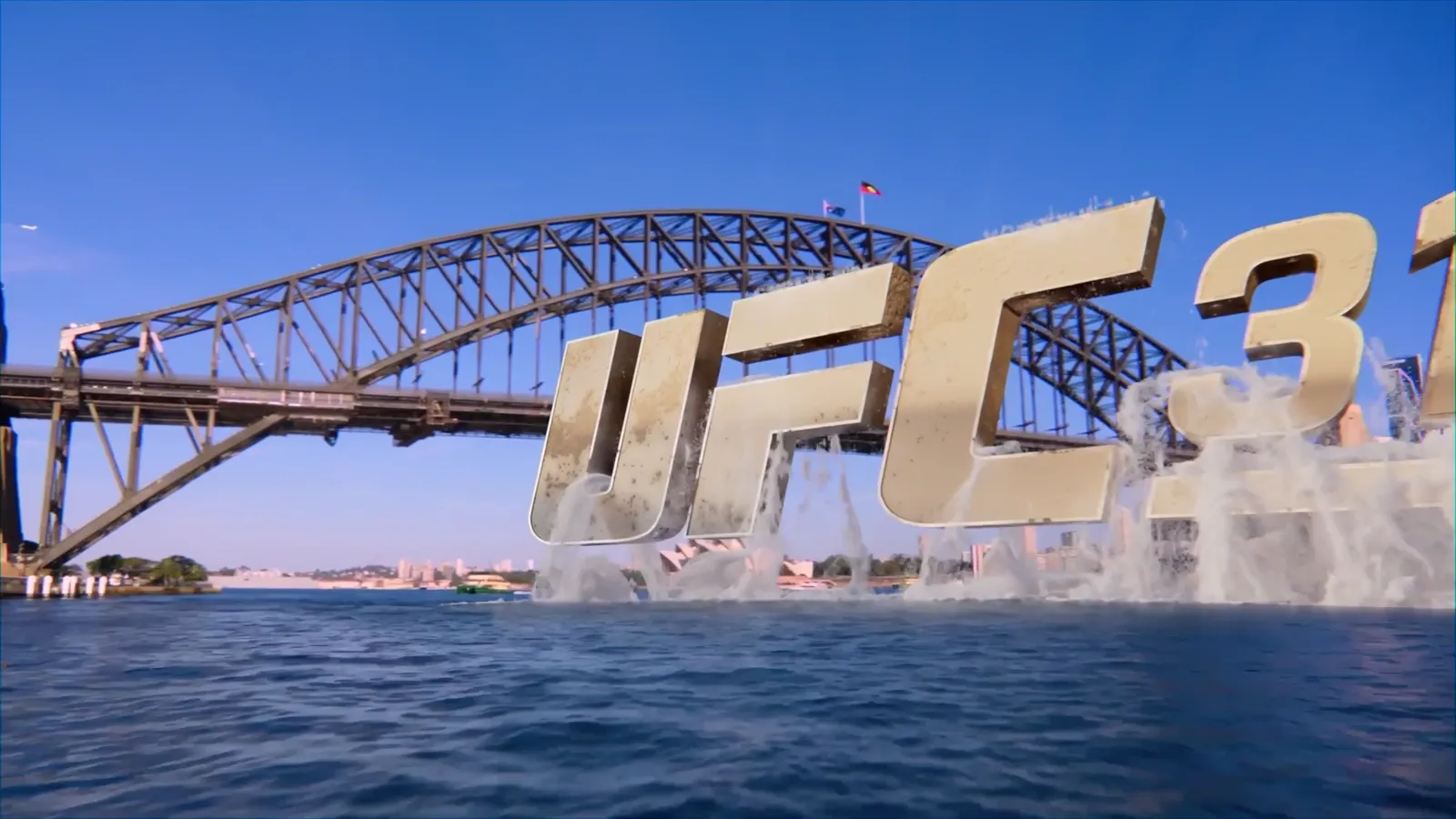 The UFC letterforms clearing the water with the Harbour Bridge behind them
