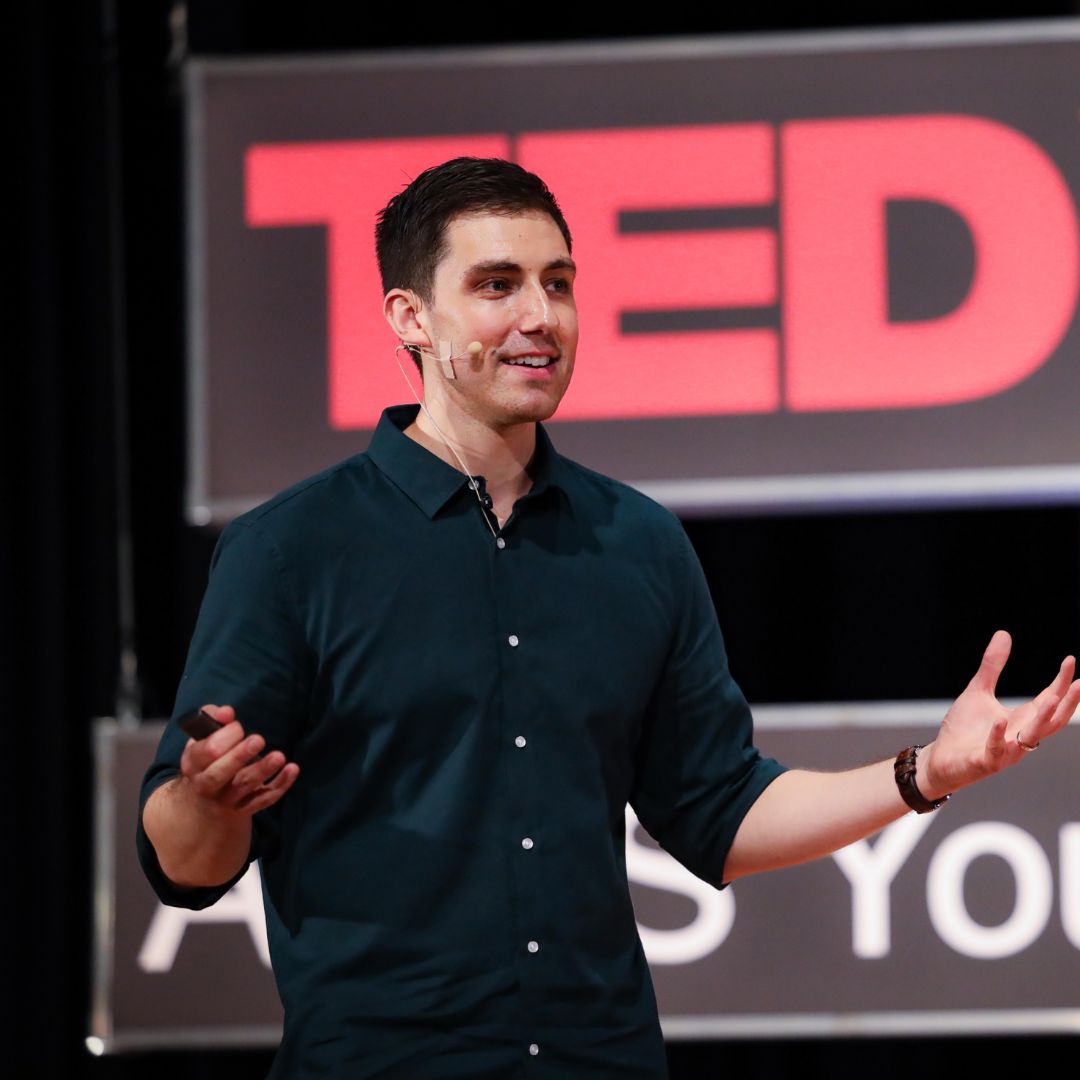 Jamie van Leeuwen giving his TED talk, Creating in the age of AI, at TEDxASAS Youth